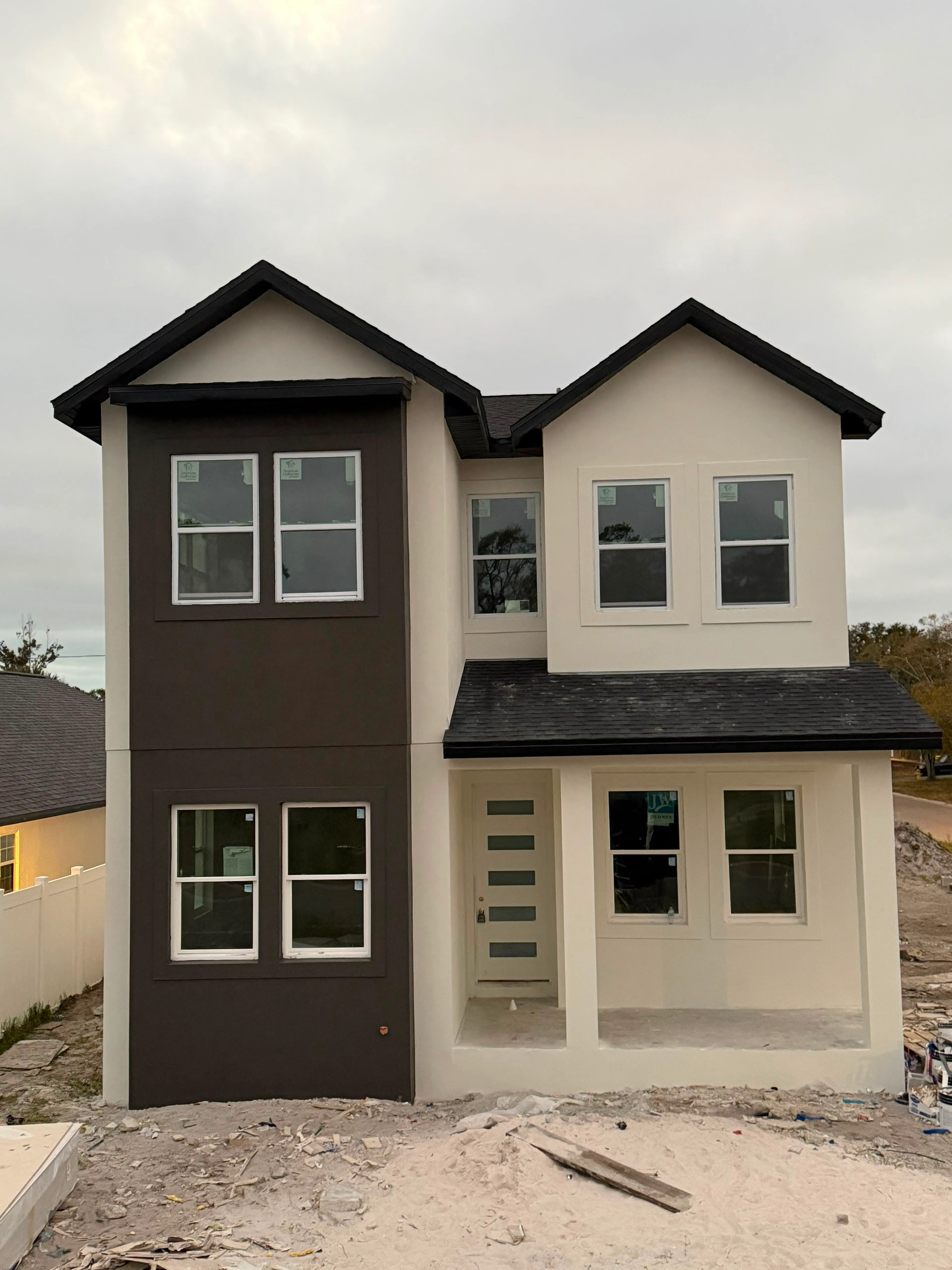 Finished stucco and exterior paint on the completed two-story elevation