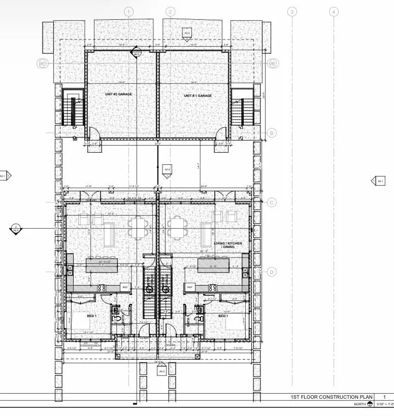 First floor construction plan of both units, showing the garages, living and dining areas and first-floor bedrooms